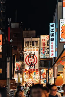 Crowd Prints: Neon lights and crowd in the streets of Osaka by night, Japan