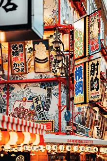 Crowd Prints: Neon lights in the streets of Osaka by night, Japan