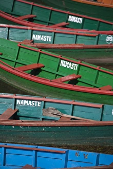 Nepal, Pokhara, Colourful canoes on Phewa Lake