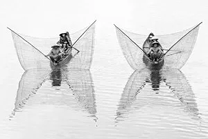 Images Dated 16th April 2019: Net casting fishermen on the Perfume River, Hue, Vietnam