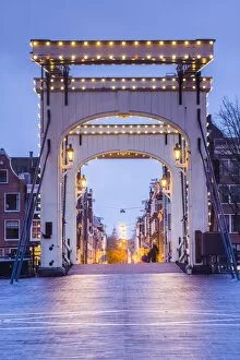 Images Dated 16th December 2015: Netherlands, Amsterdam, Magere Brug, the Skinny Bridge, dusk