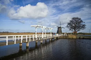Images Dated 29th July 2016: Netherlands, Kinderdijk, Traditional Dutch windmills and bridge