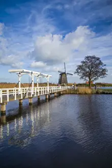 Netherlands, Kinderdijk, Traditional Dutch windmills and bridge