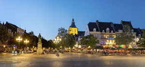 Netherlands, Limburg, Mstricht. Cafes and restaurants on Markt square at dusk