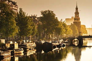 Netherlands, North Holland, Amsterdam. Montelbaan Tower at Oude Schans