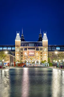 Netherlands, North Holland, Amsterdam. The Rijksmuseum on Museumplein at night