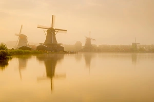 Netherlands, North Holland, Zaandam, Zaanse Schans, left to right The Seeker (De Zoeker) Oilmill
