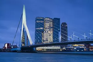 Images Dated 22nd December 2015: Netherlands, Rotterdam, Erasmusbrug bridge and new commerical towers at the renovated docklands