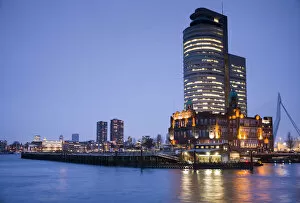 Netherlands, Rotterdam, new commerical towers of renovated port district, dusk