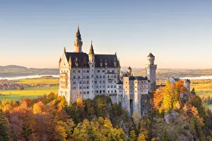 Neuschwanstein Castle in Autumn at sunset Europe, Germany, Bavaria, southwest Bavaria Neuschwanstein Castle in Autumn at sunset Europe, Germany, Bavaria, southwest Bavaria
