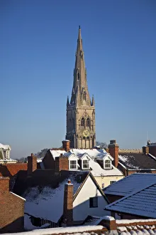 Images Dated 10th June 2011: Newark, UK. The Church of St Mary Magdalene rises above Newarks eclectic roofscape