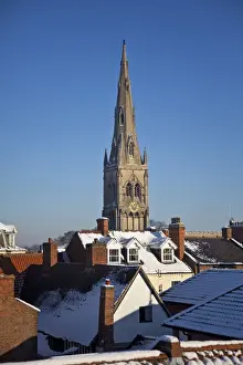 Midlands Prints: Newark, UK. The Church of St Mary Magdalene rises above Newarks eclectic roofscape