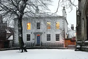 Midlands Prints: Newark, UK. A Georgian town house sits on the edge of the churchyard