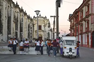 Nicaraguan Prints: Nicaragua, Leon, Schoolchildren sitting on wall of Leon Cathedral