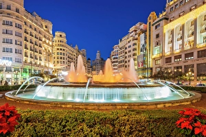 Night view of the fountain in Plaza del Ayuntamiento, Valencia, Valencian Community, Spain
