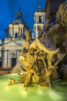 Baroque Style Prints: Night view of Fountain of the four Rivers, Piazza Navona, Rome, Lazio, Italy