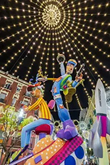 Figures Prints: Night view of giant sculptures in Ruzafa or Russafa ward during the Annual Fallas Festival