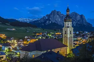 Kastelruth Prints: Night view over the mountain village of Castelrotto Kastelruth, Alto Adige or South Tyrol