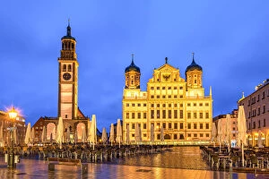 Night view of Rathausplatz with Perlachturm tower on the left side and the city hall