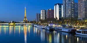 Images Dated 16th December 2015: Night view of River Seine with high-rise buildings on the Left Bank, and Eiffel Tower