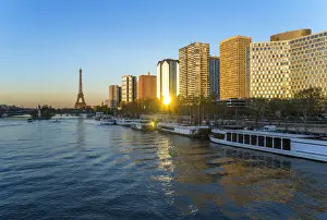 Left Bank Prints: Night view of River Seine with high-rise buildings on the Left Bank, and Eiffel Tower