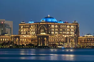 Night view from the sea over the Emirates Palace hotel, Abu Dhabi, United Arab Emirates