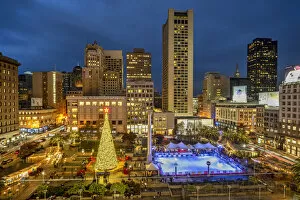 Night view of Union Square adorned with Christmas tree and ice rink, San Francisco, California, USA