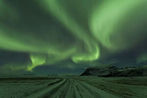 Images Dated 8th April 2013: Northern Lights, Aurora Borealis, Winter road with snow, Iceland