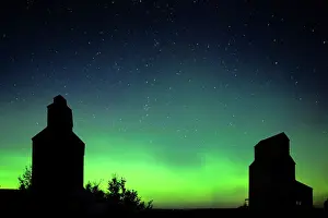 Northern lights (aurora borealis) and grain elevator in ghost town Bents Saskatchewan, Canada