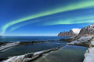 Tungeneset Prints: Northern lights above the bay facing Tungeneset. Tungeneset, Ersfjorden, Senja, Norway