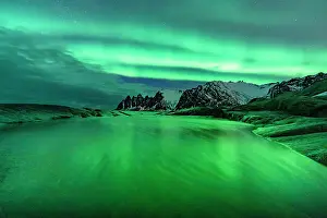 Aurora Borealis Prints: Northern Lights over Devil's Teeth sharp mountain peaks from Tungeneset