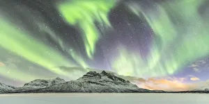 Images Dated 14th August 2019: Northern lights in the sky above Skoddebergvatnet lake