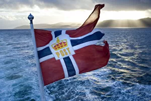 Images Dated 4th April 2011: Norwegian flag, on the Hurtigruten coastal express, Northern Norway
