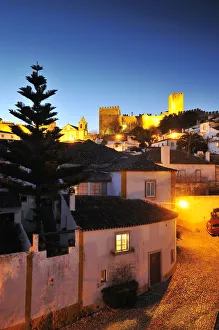 Covers Prints: Obidos, one of the most picturesque medieval villages in Portugal, at dusk