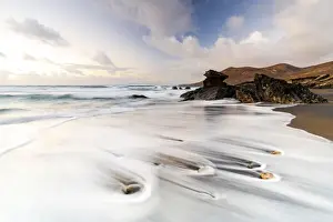 Long Exposure Prints: Ocean waves breaking on sand beach Playa de la Solapa at sunset, Fuerteventura