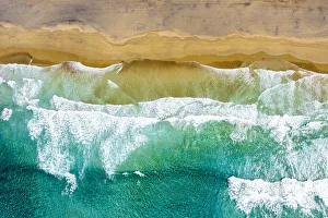 Wind Prints: ocean waves crashing on the golden sand of Cofete Beach, Jandia, Fuerteventura