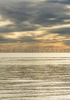 Offshore wind farm as viewed from Brighton beach, East Sussex, England