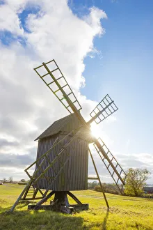 Oland, Eastern Sweden, Northern Europe. Typical windmills along the road Oland, Eastern Sweden, Northern Europe. Typical windmills along the road