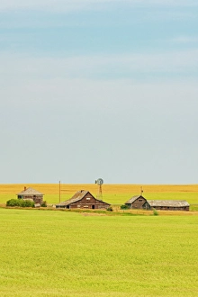 Prairies Prints: Old, abandonned homestead with barrn