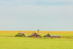 Prairies Prints: Old, abandonned homestead with barrn