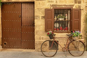 Images Dated 27th September 2023: Old Bike under Traditional Window & Door, Laguardia, Alava, Spain