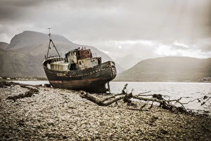 The Old Boat of Corpach with Ben Nevis in the background, Fort William, Scotland, UK