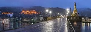 Old Bridge and castle illuminated at night in winter, Heidelberg, Baden-Wurttemberg