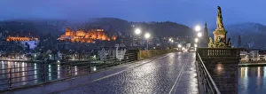 Heidelberg Prints: Old Bridge and castle illuminated at night in winter, Heidelberg, Baden-Wurttemberg