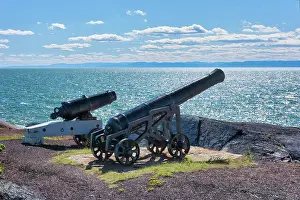 Lawrence River Prints: Old canons on the shore of the St. Lawrence River near the lighthouse, Quebec, Canada
