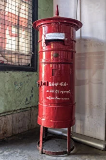 Images Dated 8th June 2021: Old colonial style red letterbox in post office in Yangon, Myanmar