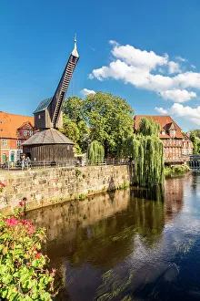 Hanseatic League Prints: Old crane on the Ilmenau, in the background Luner Mill, Luneburg, Lower Saxony, Germany