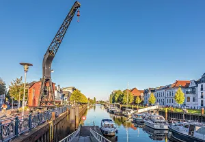 Summer Evening Prints: Old crane at the inland port of Oldenburg, Oldenburger Land, Lower Saxony, Germany