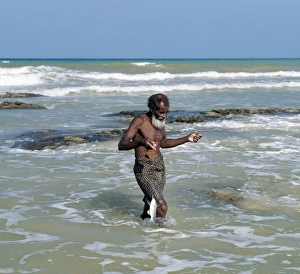 Socotra Prints: An old fisherman brings in his catch at Apallhen Beach