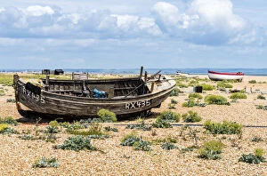 Old fishing boat on Dungeness shingle beach, Kent, England
